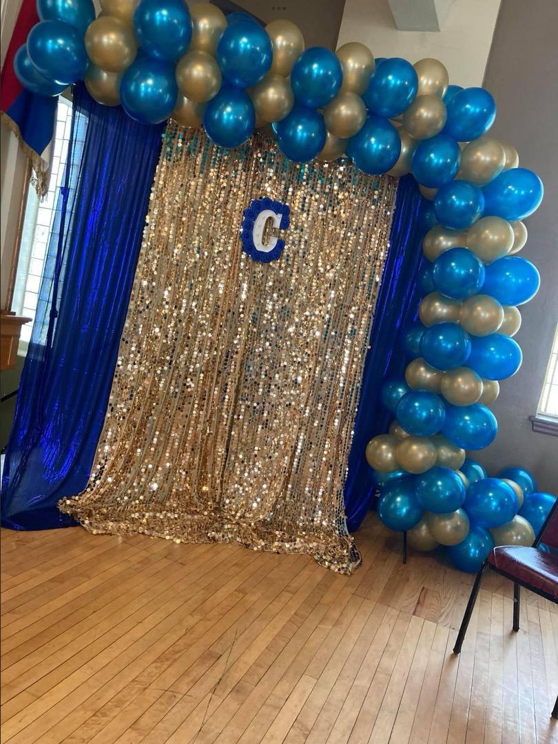 Colorful balloon arch backdrop for birthday or baby shower
